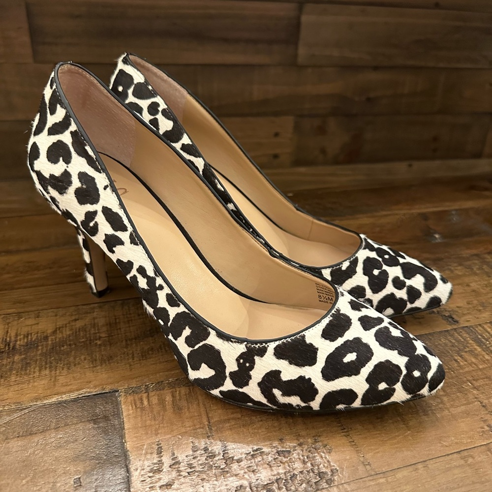 INC women’s dress shoes, white/black cheetah design with cow hide texture.